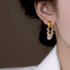 Close-up detail of the sparkling zircons and plating on the Zircon Jacket Earrings