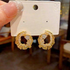 Close-up detail of the sparkling zircons and plating on the Irregular Earrings