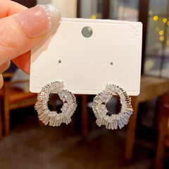 Angled view of the 14K Gold-Plated Elegant Zircon Diamond Irregular Earrings