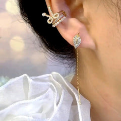 Model showcasing the dangle and style of the 14K Gold-Plated Elegant Zircon Diamond Leaf Threader Earrings