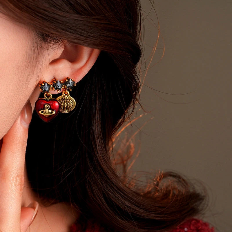 Close-up detail of the sparkling zircons and plating on the Saturn Earrings