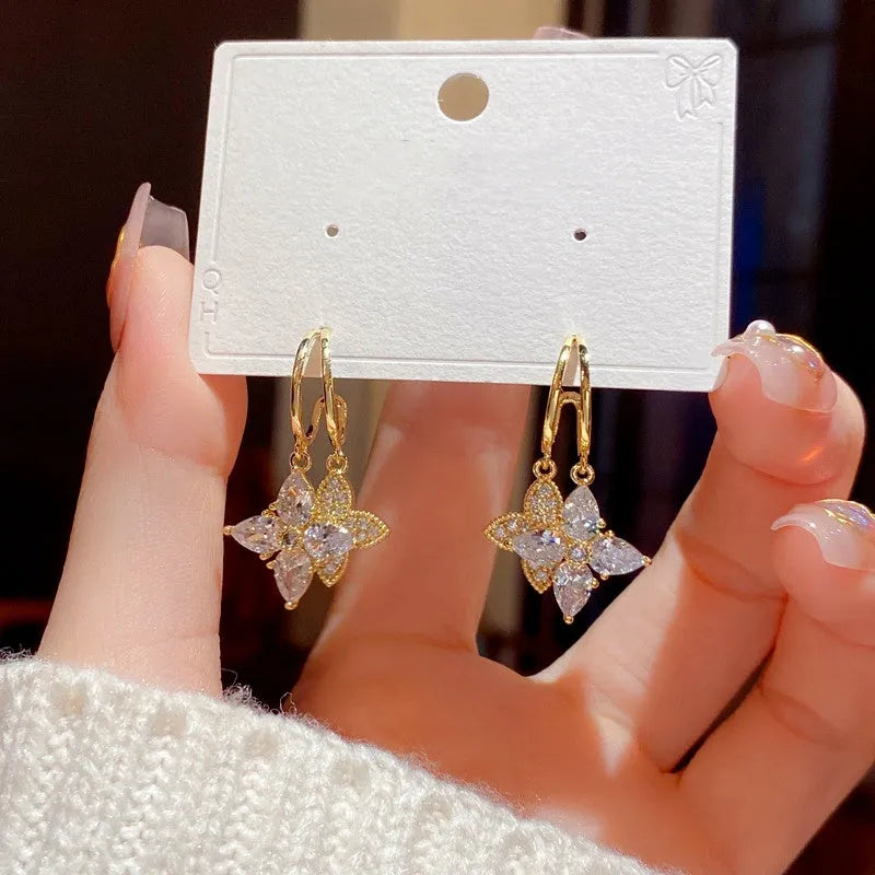 Angled view of the 14K Gold-Plated Elegant Zircon Diamond Star Earrings