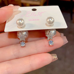 Close-up detail of the sparkling zircons and plating on the Pearl Jacket Earrings