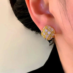 Close-up detail of the sparkling zircons and plating on the Zircon Studs