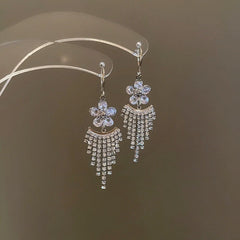 Angled view of the 14K Gold-Plated Elegant Zircon Diamond flower Tassel Earrings