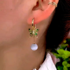 Angled view of the 14K Gold-Plated Elegant Zircon Diiamond Butterfly Cat's Eye Stone Earrings