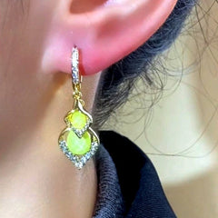 Close-up detail of the sparkling zircons and plating on the Double-Leaf Earrings