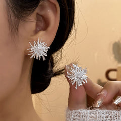 Angled view of the 14K Gold-Plated Elegant Zircon Firework Stud Earrings