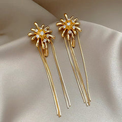 Angled view of the 14K Gold-Plated Elegant Zircon Fireworks Tassel Earrings