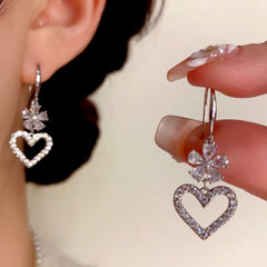Angled view of the 14K Gold-Plated Elegant Zircon Flower Heart Ear Hooks