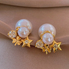 Close-up detail of the sparkling zircons and plating on the gold pearl earrings