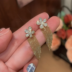 Angled view of the 14K Gold-Plated Elegant Zircon Flower Tassel Earrings