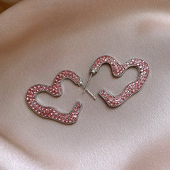 Angled view of the 14K Gold-Plated Elegant Zircon Heart Earrings