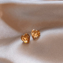 Angled view of the 14K Gold-Plated Elegant Zircon Heart Stud Earrings