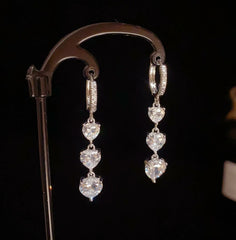 Angled view of the 14K Gold-Plated Elegant Zircon Heart Tassel Earrings