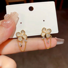 Angled view of the 14K Gold-Plated Elegant Zircon Oil Drop Flower Chain Tassel Earrings