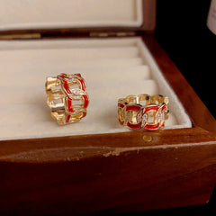 Angled view of the 14K Gold-Plated Elegant Zircon Paint Chain Hoop Earrings