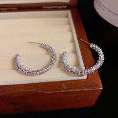 Angled view of the 14K Gold-Plated Elegant Zircon Pearl C-Hoop Earrings
