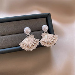 Angled view of the 14K Gold-Plated Elegant Zircon Pearl Shell Earrings