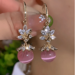 Angled view of the 14K Gold-Plated Elegant Zircon Pink Beads Earrings