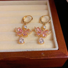 Close-up detail of the sparkling zircons and plating on the Butterfly Water Drop Earrings