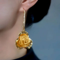 Close-up detail of the sparkling zircons and plating on the Rose Ear Buckle Earrings