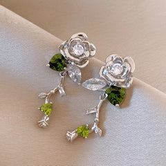 Close-up detail of the sparkling zircons and plating on the Rose Tassel Earrings