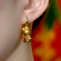 Close-up detail of the sparkling zircons and plating on the Lady Tassel Earrings