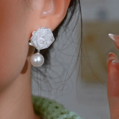 Angled view of the 14K Gold-Plated Elegant Zircon Rose Pearl Earrings