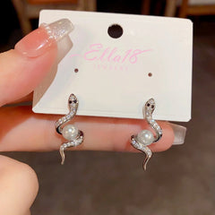 Angled view of the 14K Gold-Plated Elegant Zircon Snake-Shaped Pearl Earrings