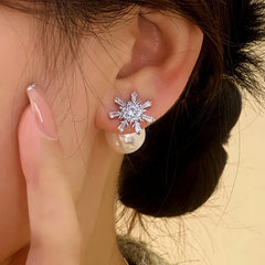Close-up detail of the sparkling zircons and plating on the Snowflake Jacket Earrings