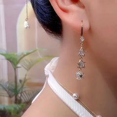 Close-up detail of the sparkling zircons and plating on the Star Ear Hook Earrings