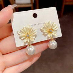 Close-up detail of the sparkling zircons and plating on the Sunflower Pearl Earrings