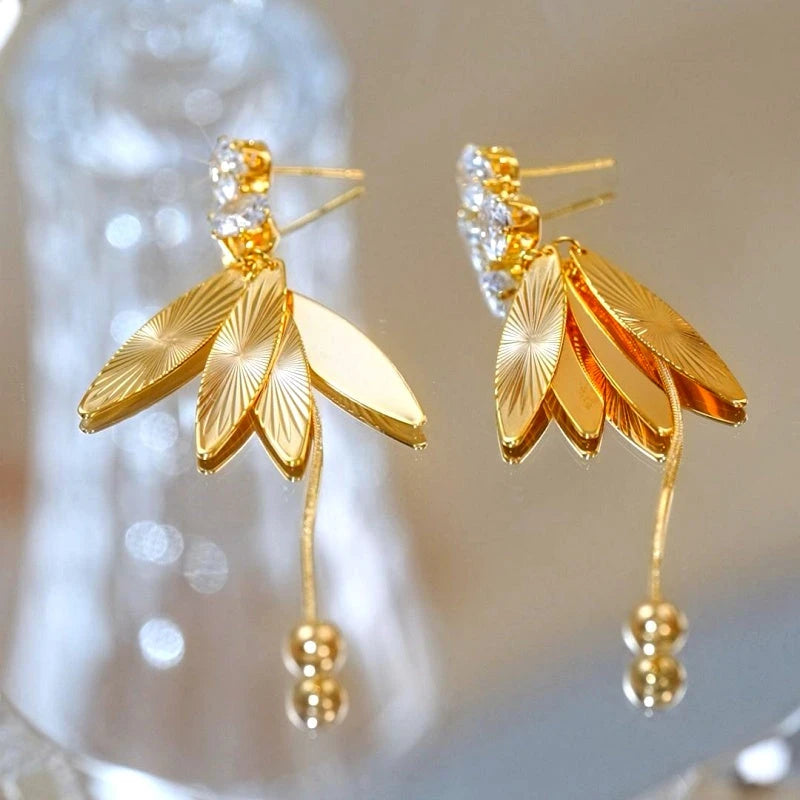 Angled view of the 14K Gold-Plated Elegant Zircon Tassel Earrings