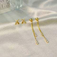 Angled view of the 14K Gold-Plated Elegant Zircon X Cross Tassel Earrings
