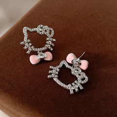 Angled view of the 14K Gold-Plated Elegant Zircon Bow Kitten Earrings