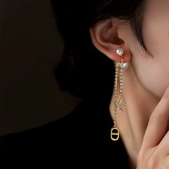 Close-up detail of the sparkling zircons and plating on the Star Pearl Jacket Earrings