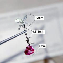 Angled view of the 14K Gold-Plated Elf Heart Earrings