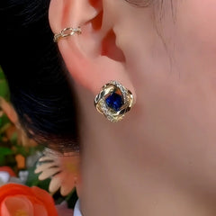 Close-up detail of the sparkling zircons and plating on the Blue Diamond Studs