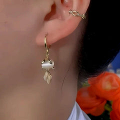 Close-up detail of the sparkling zircons and plating on the Cute Cat Earrings