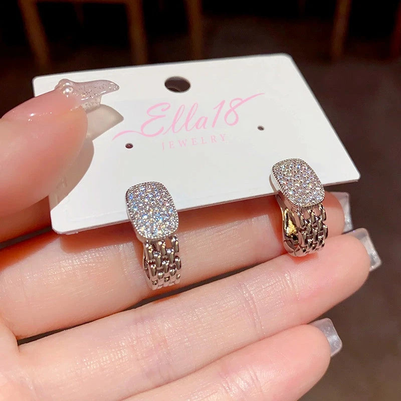 Angled view of the 14K Gold-Plated Exquisite Diamond Earrings