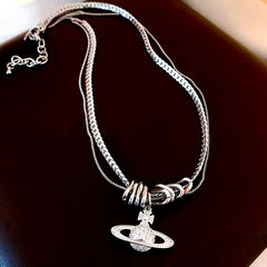 Detailed view of the 14K Gold-Plated Exquisite Saturn Pendant Necklace chain and pendant