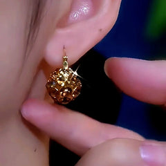 Close-up detail of the sparkling zircons and plating on the Zircon French Earrings