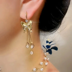 Close-up detail of the sparkling zircons and plating on the Butterfly Tassel Earrings