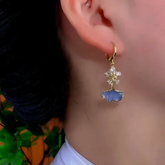 Close-up detail of the sparkling zircons and plating on the Ginkgo Leaf Earrings