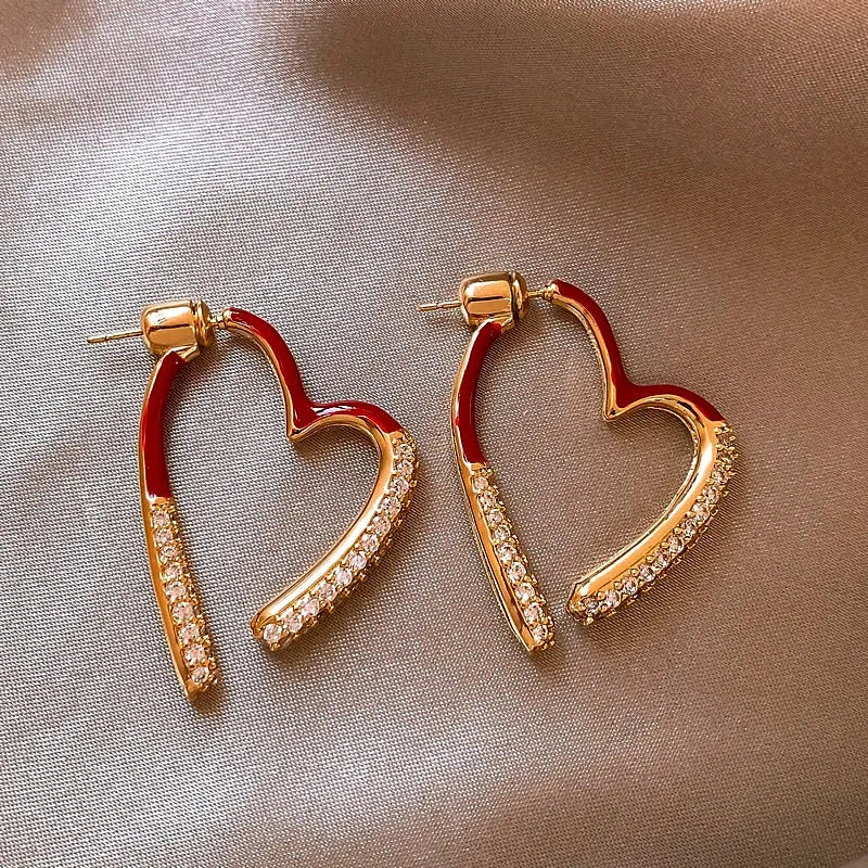 Angled view of the 14K Gold-Plated Exquisite Christmas Zircon Heart-Design Earrings