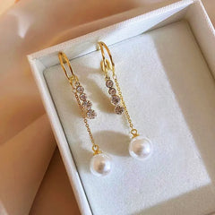 Angled view of the 14K Gold-Plated Exquisite Zircon Pearl Earrings