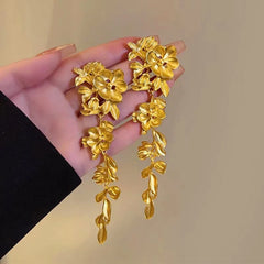 Close-up detail of the sparkling zircons and plating on the Leaf Tassel Earrings