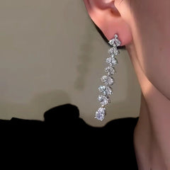 Close-up detail of the sparkling zircons and plating on the Flower Water Drop Earrings