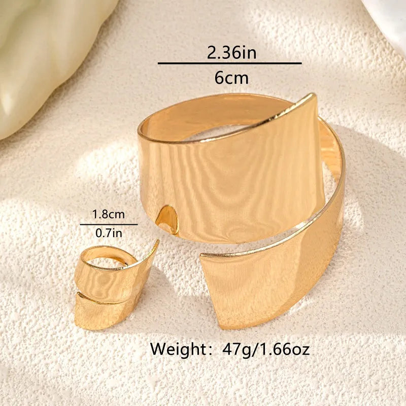 Close-up of the clasp and charm details on the Geometric Cuff Set